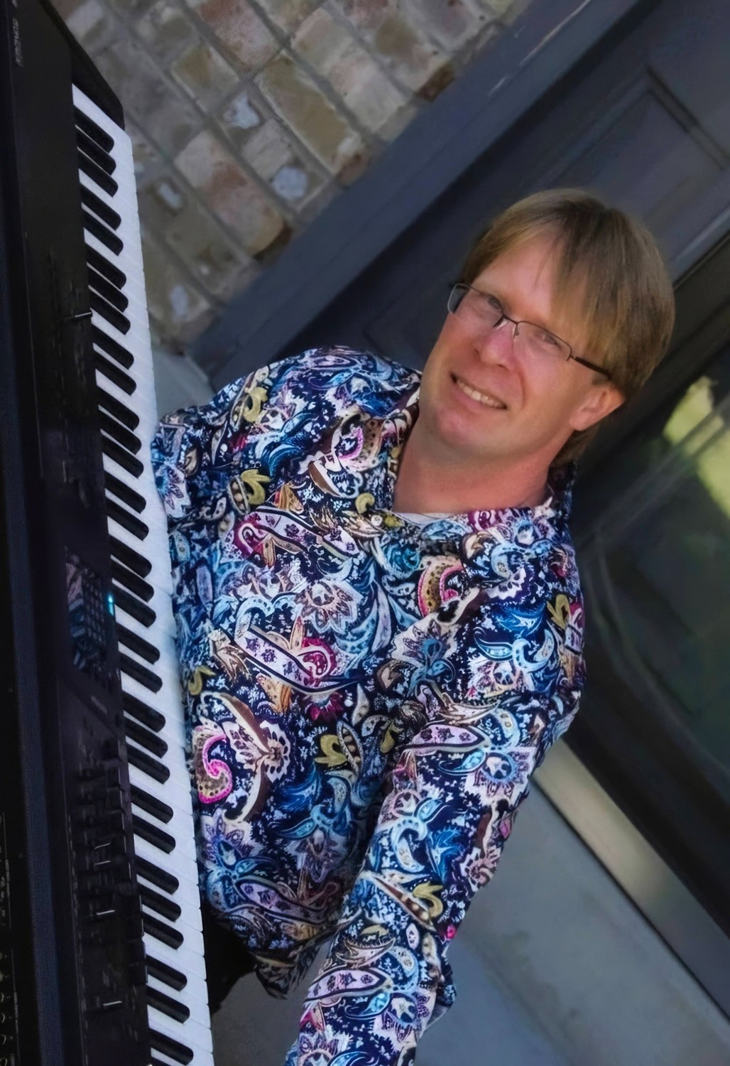 Erik D. Anderson with his keyboard